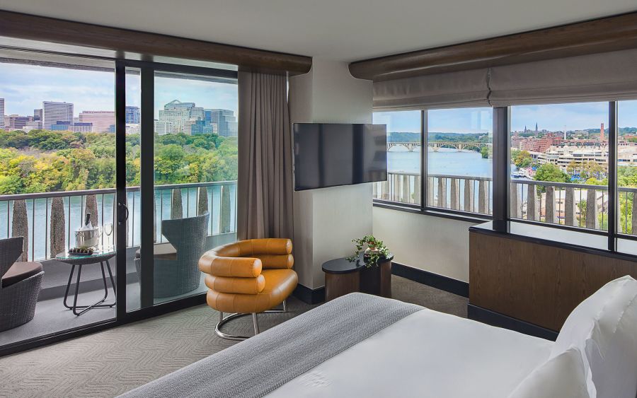 A Bedroom With A View Of The City