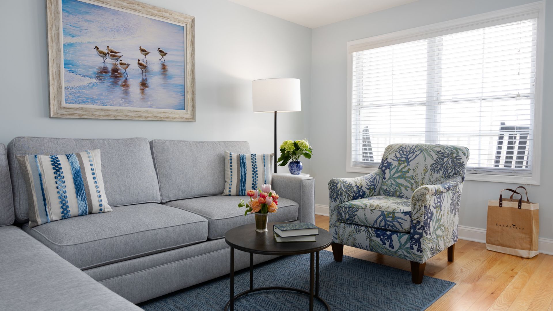 A Living Room With A Couch And A Coffee Table