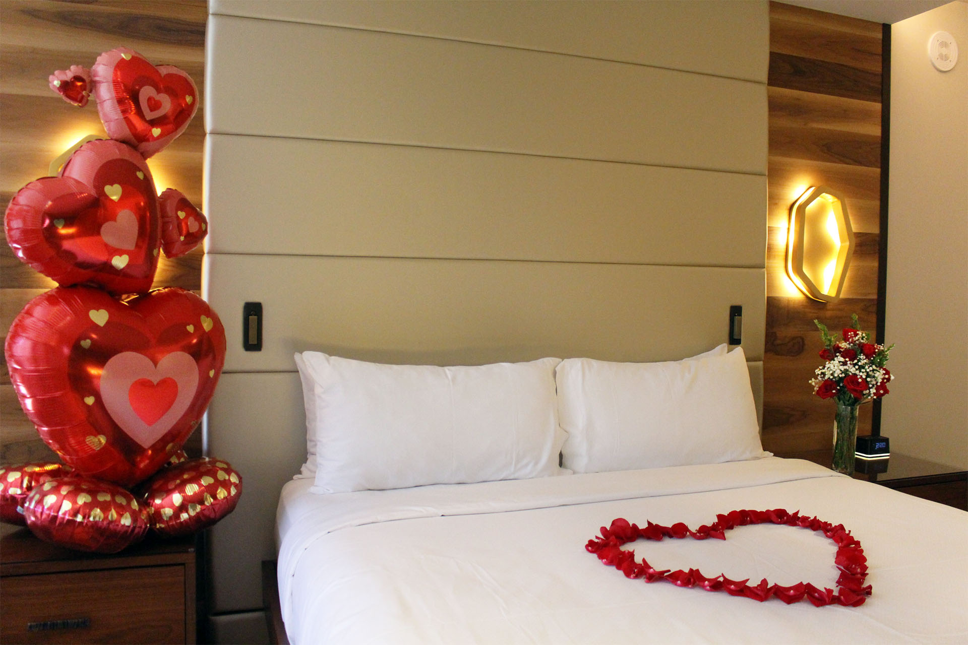 A Bed With A White Bed Spread