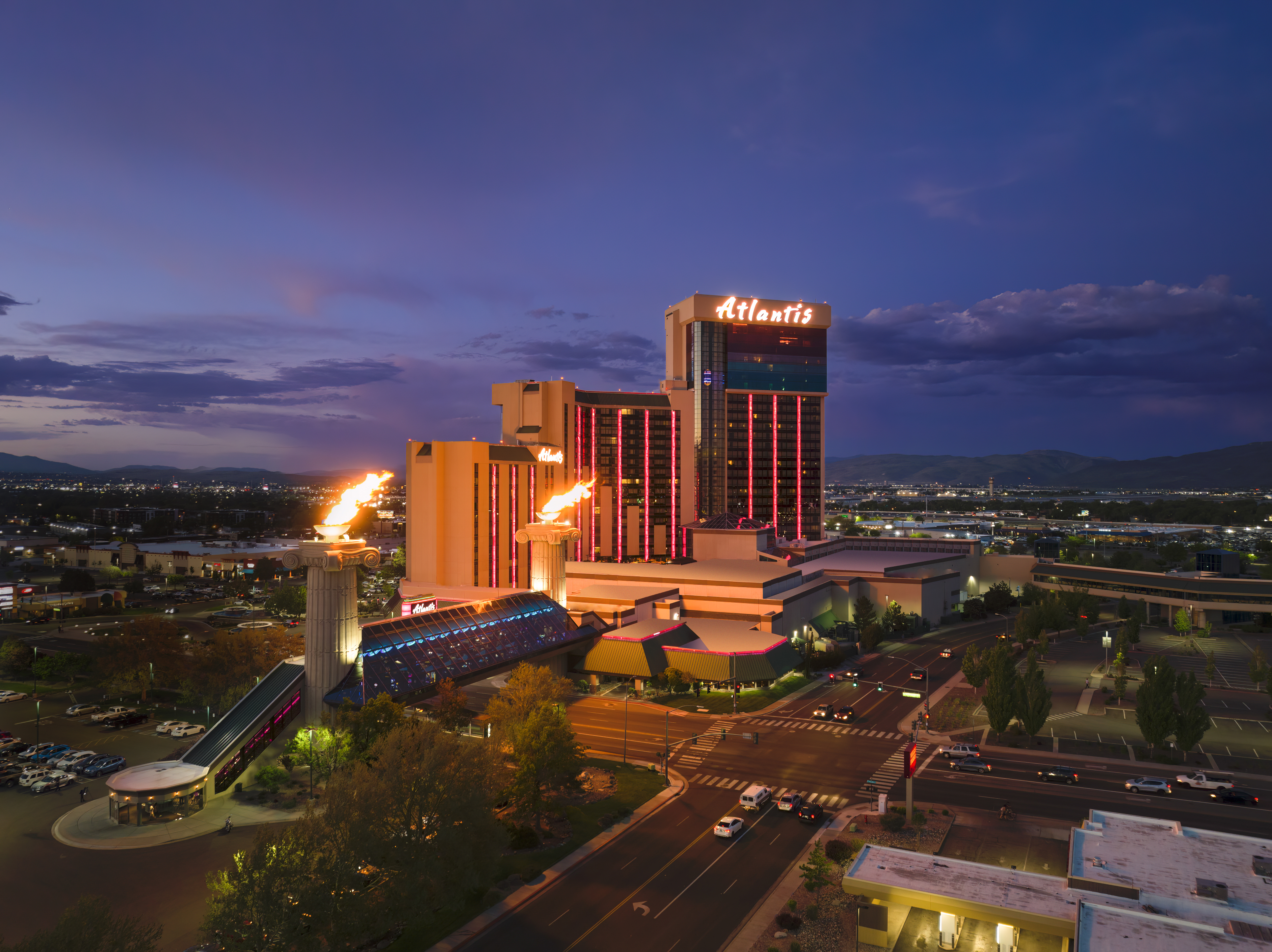 A City With A Large Building At Night