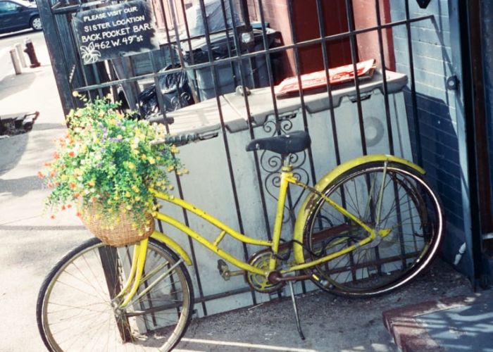 A Bicycle Parked On The Sidewalk