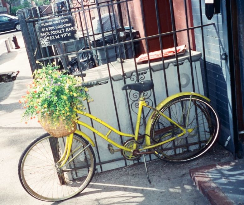 A Bicycle Parked On The Sidewalk