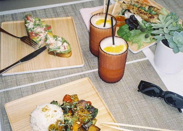 A Table With Food And Drinks On It