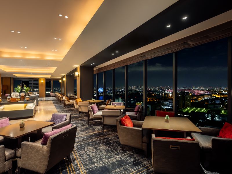 A Room With A Large Window And A Large Pool Table