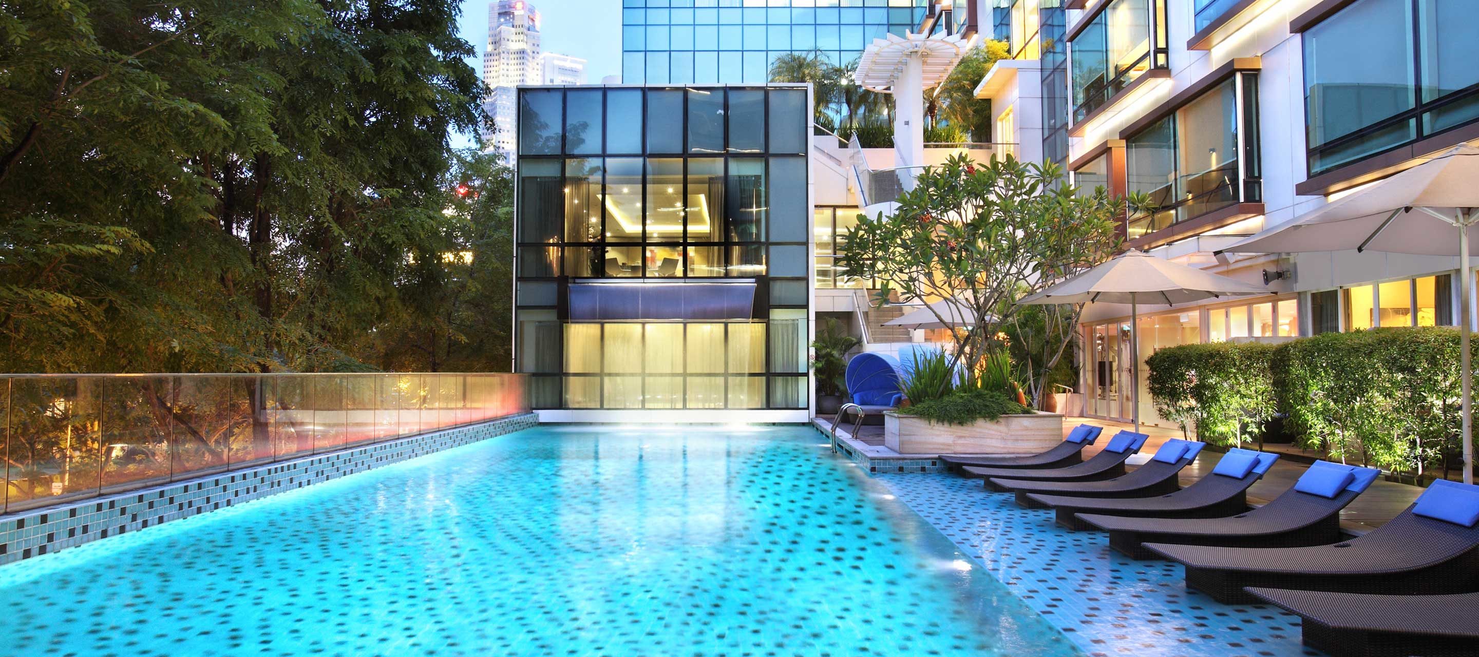 A Swimming Pool Outside A Building