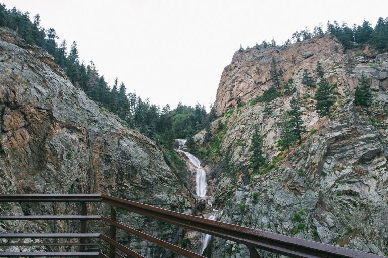 A Bridge Over A Rocky Cliff