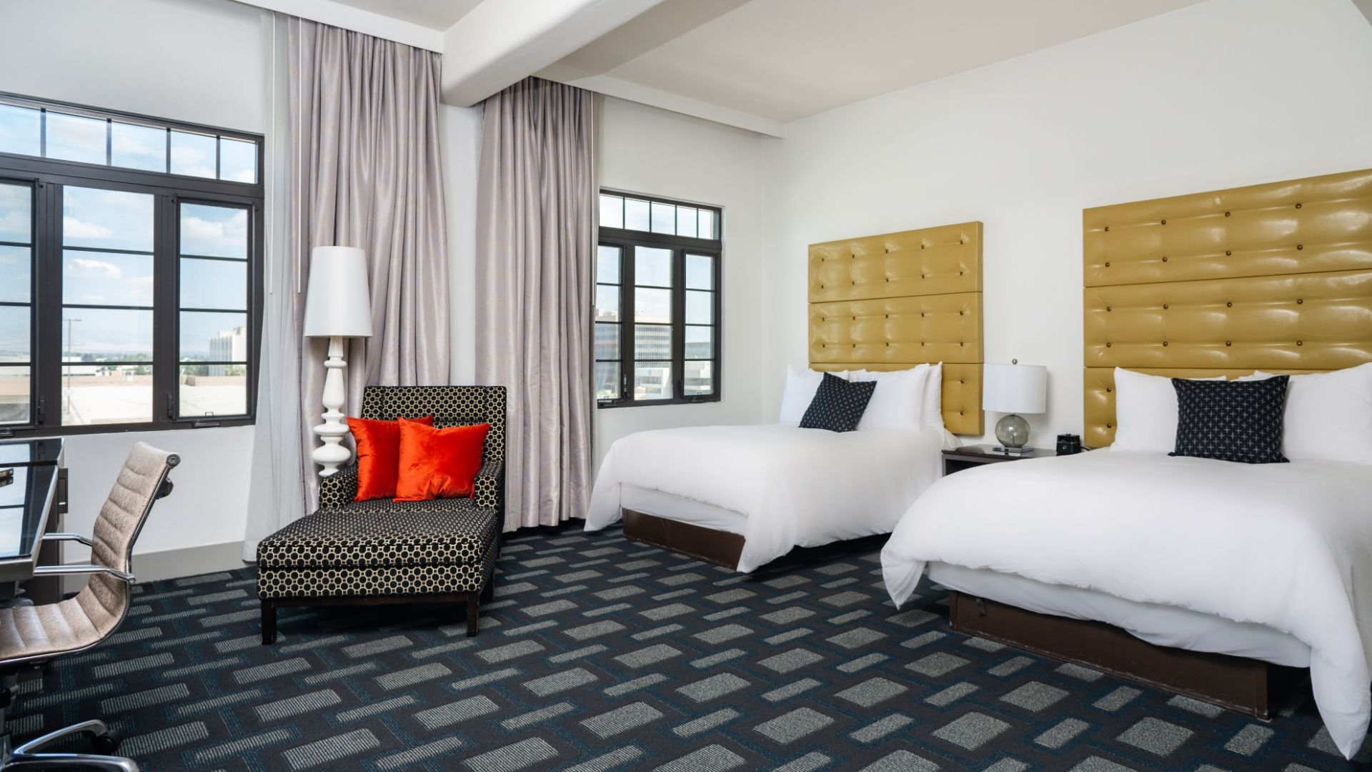 A Bedroom With Two Beds