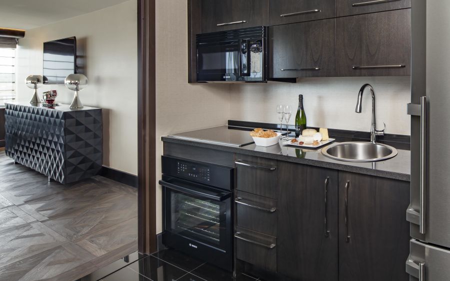 A Kitchen With Black Cabinets