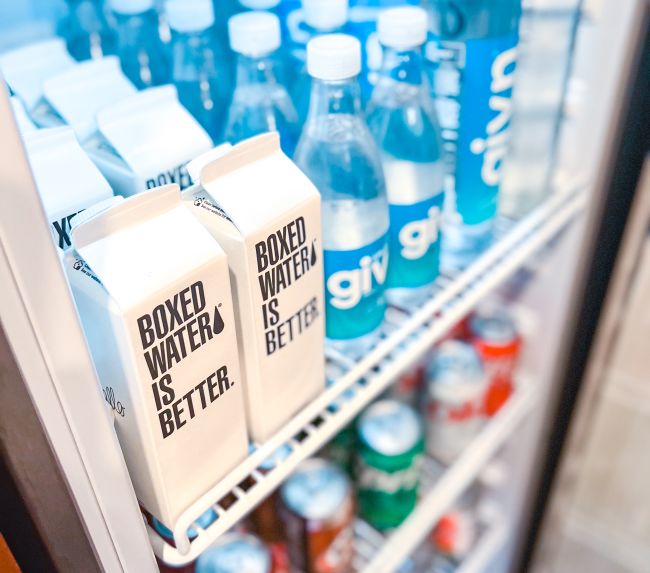 A Refrigerator Full Of Bottled Beverages