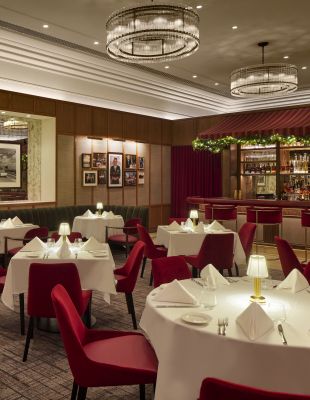 Rao's Private Dining Room and Bar With Tables And Chairs | Loews Miami Beach Hotel