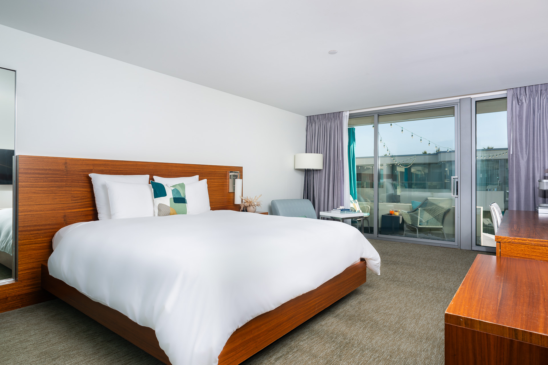 A Bedroom With A Large Bed