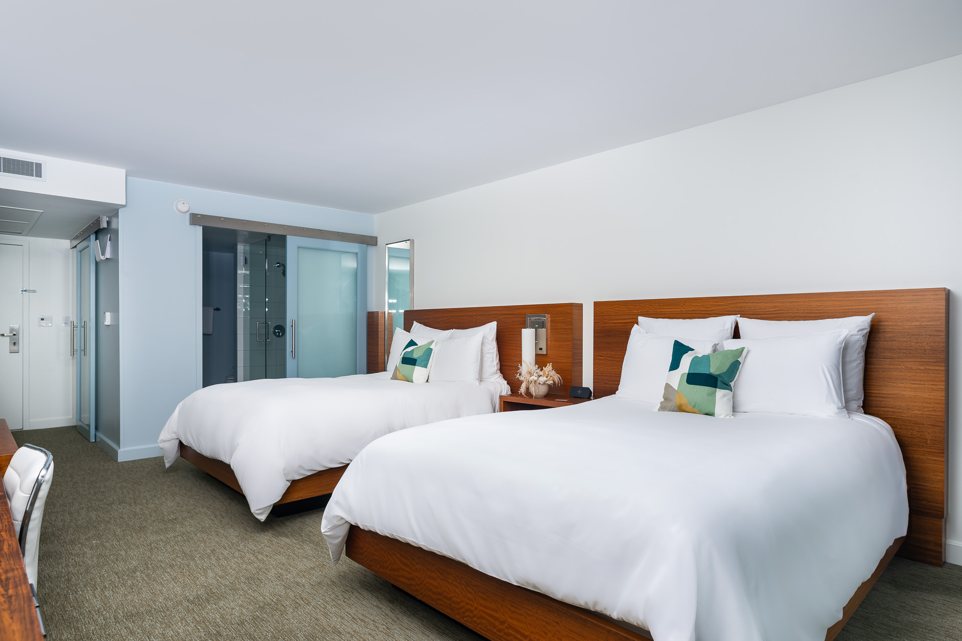A Bedroom With Two Beds